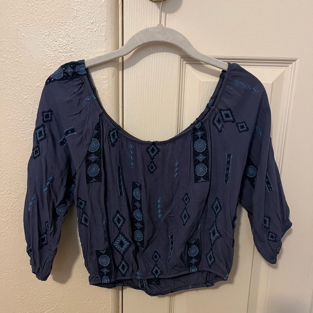 Small blue off the shoulder top.